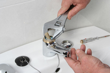 Plumber working on site