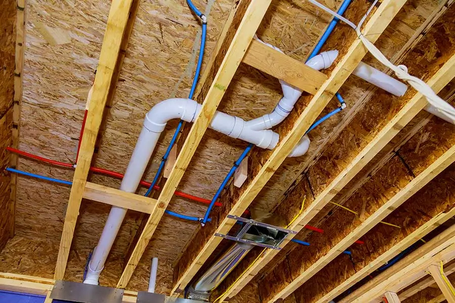 Exposed Plumbing in Ceiling Framing